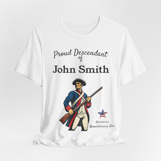 White t-shirt with a graphic of a Revolutionary War soldier and text 'Proud Descendant of Patriot' on a white background.